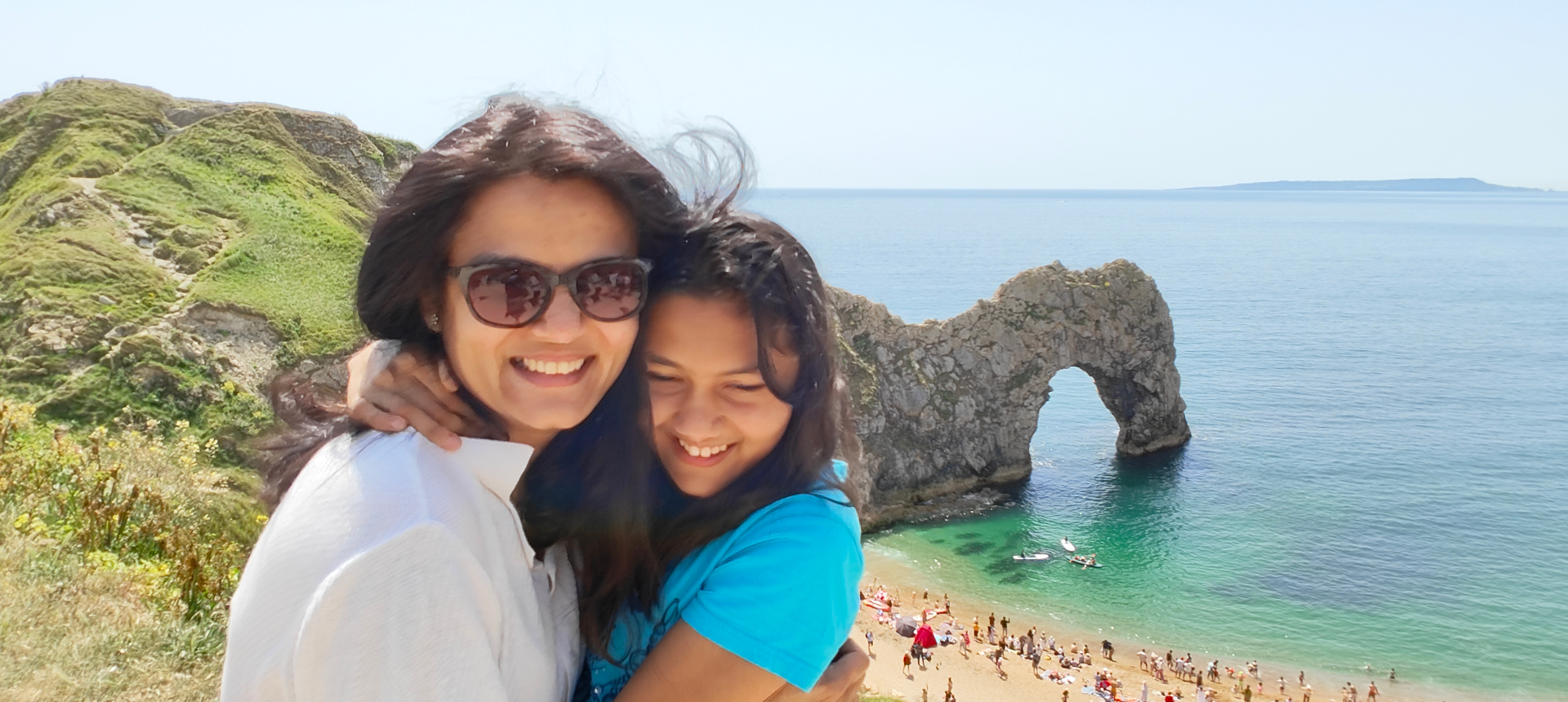 Neha Mehta with her daughter at Durdle Door on the Dorset coast